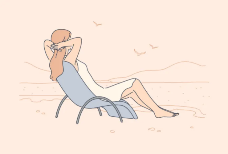 浜辺で休む女性